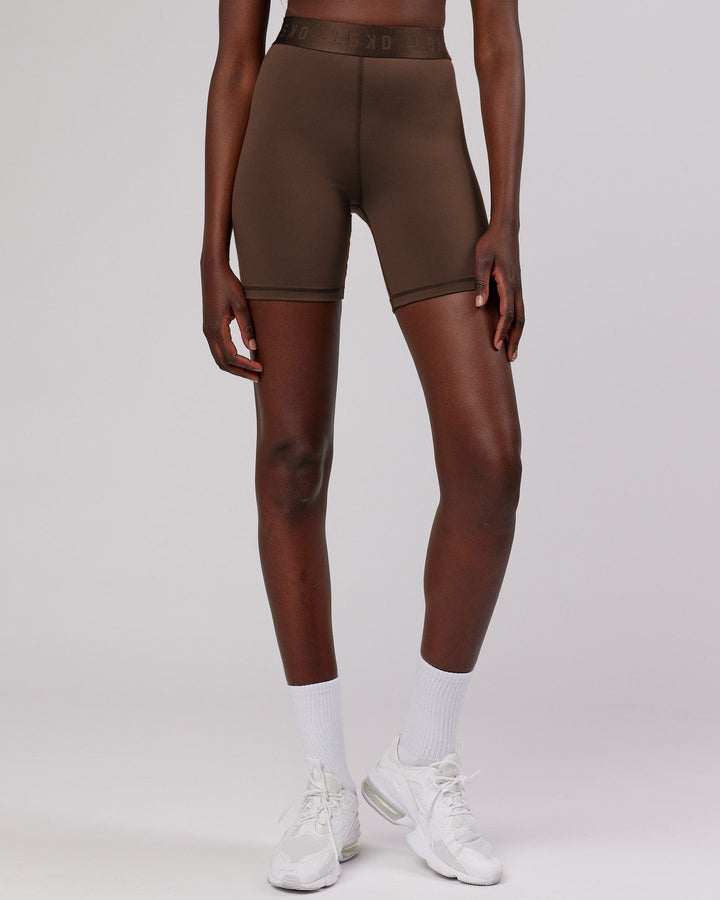 Woman wearing Competition Mid Short Tight - Walnut