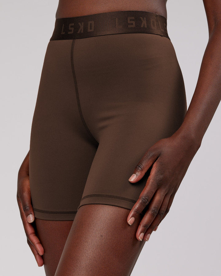 Woman wearing Competition Mid Short Tight - Walnut