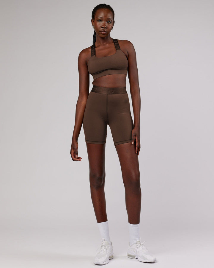 Woman wearing Competition Mid Short Tight - Walnut