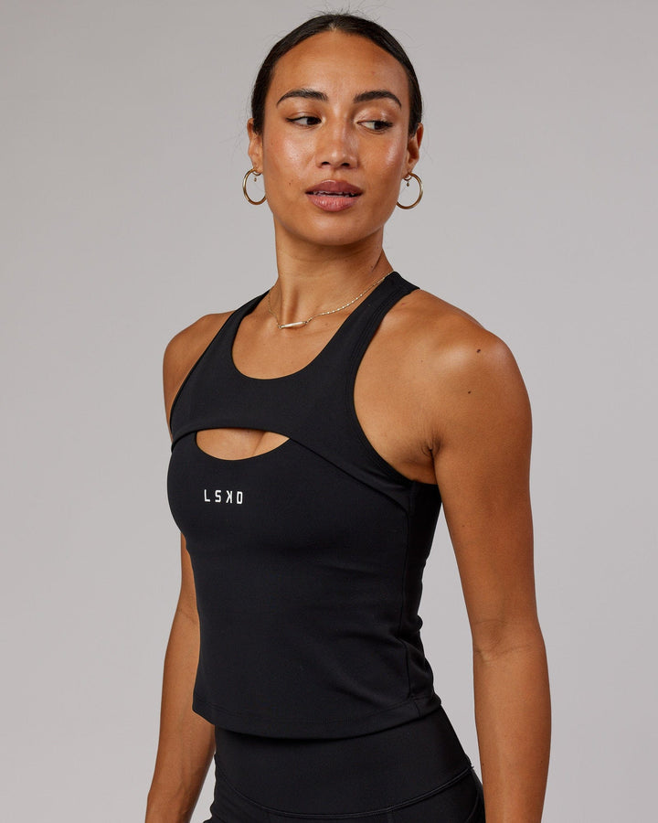 Woman wearing Driven Shelf Bra Performance Tank - Black