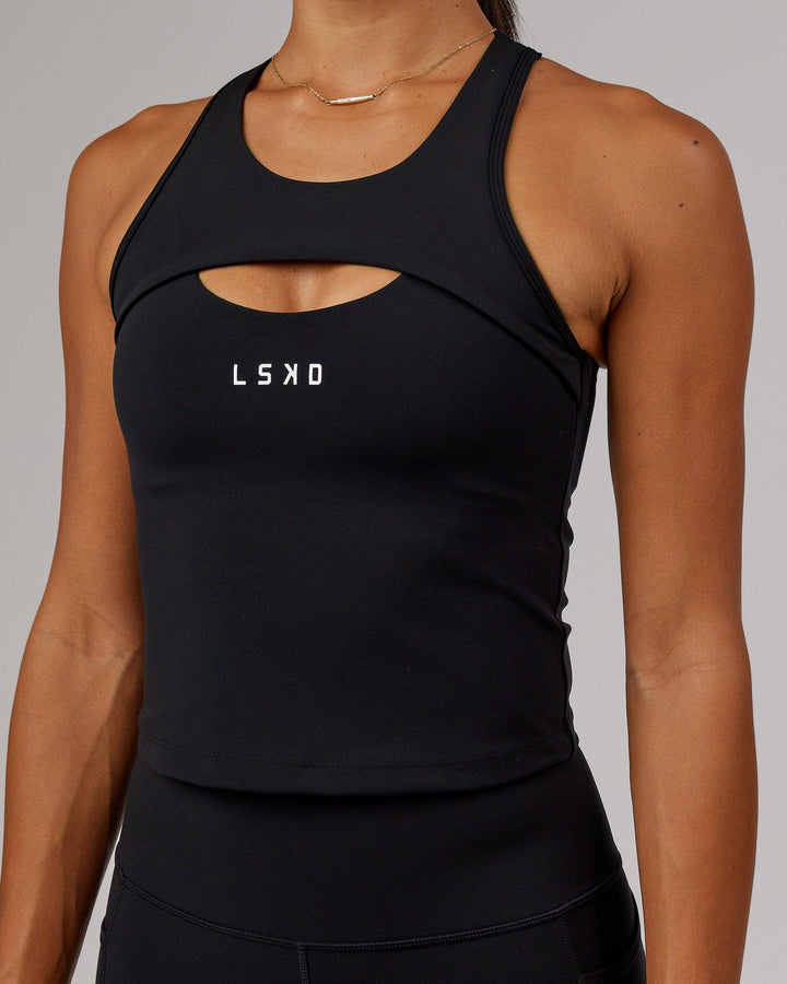 Woman wearing Driven Shelf Bra Performance Tank - Black