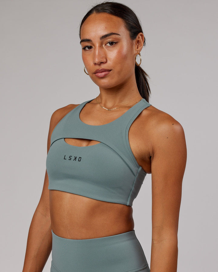 Woman wearing Driven Sports Bra - Eclipse
