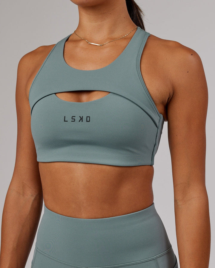 Woman wearing Driven Sports Bra - Eclipse