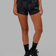 Woman wearing Social Run Short - Black Camo