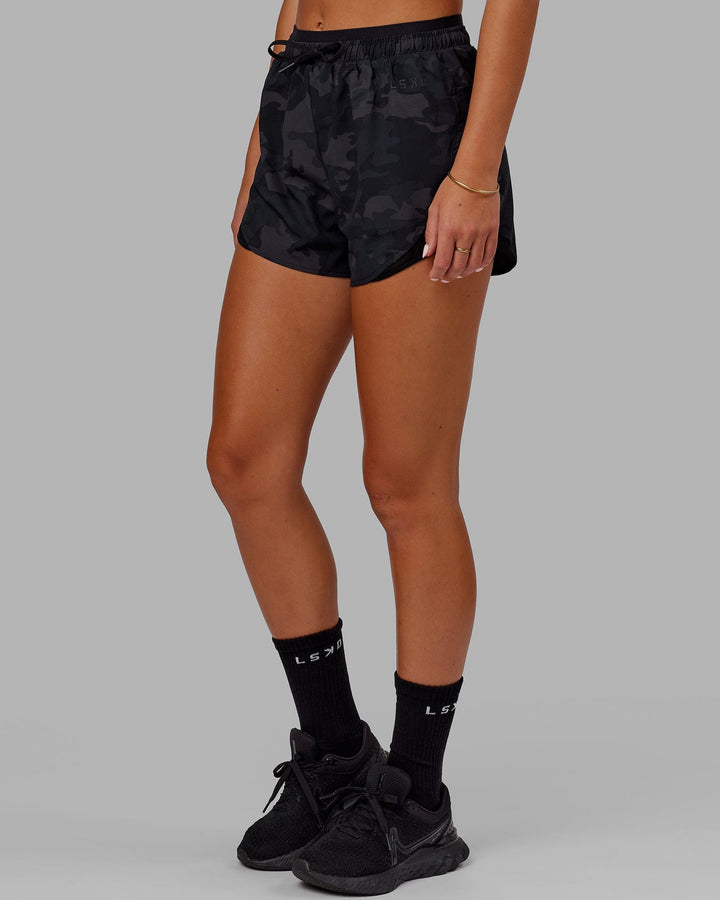 Woman wearing Social Run Short - Black Camo