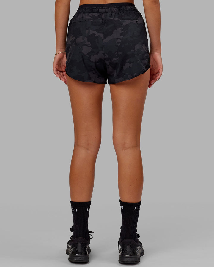 Woman wearing Social Run Short - Black Camo