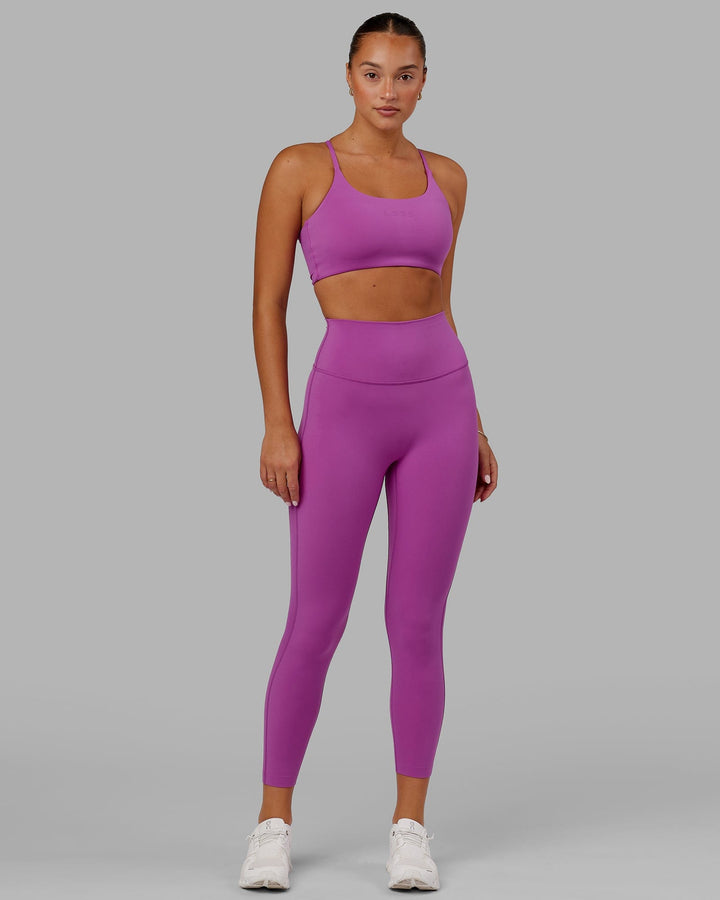 Woman wearing Elixir 7/8 Length Tight - Orchid