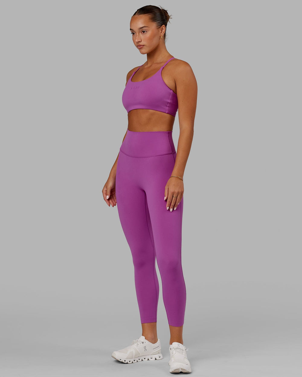 Woman wearing Elixir 7/8 Length Tight - Orchid