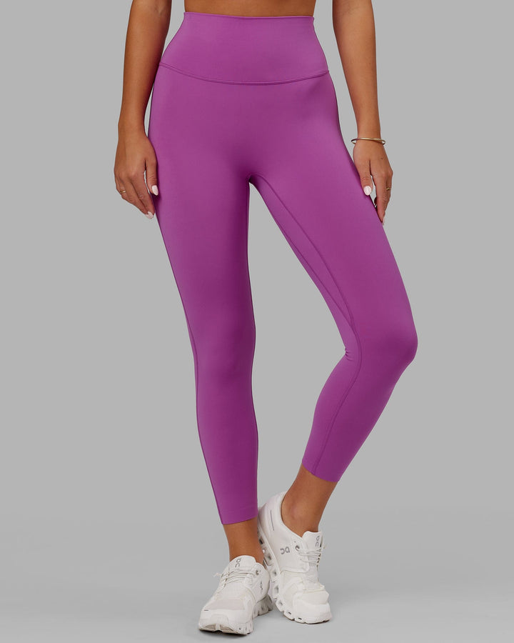 Woman wearing Elixir 7/8 Length Tight - Orchid