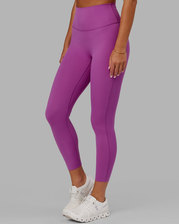Woman wearing Elixir 7/8 Length Tight - Orchid