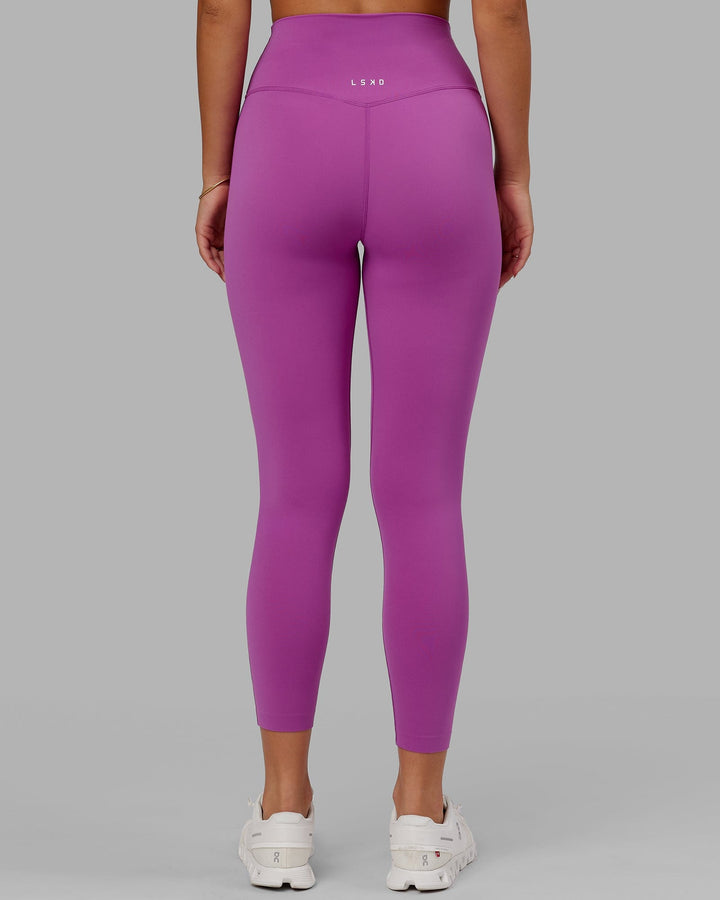 Woman wearing Elixir 7/8 Length Tight - Orchid