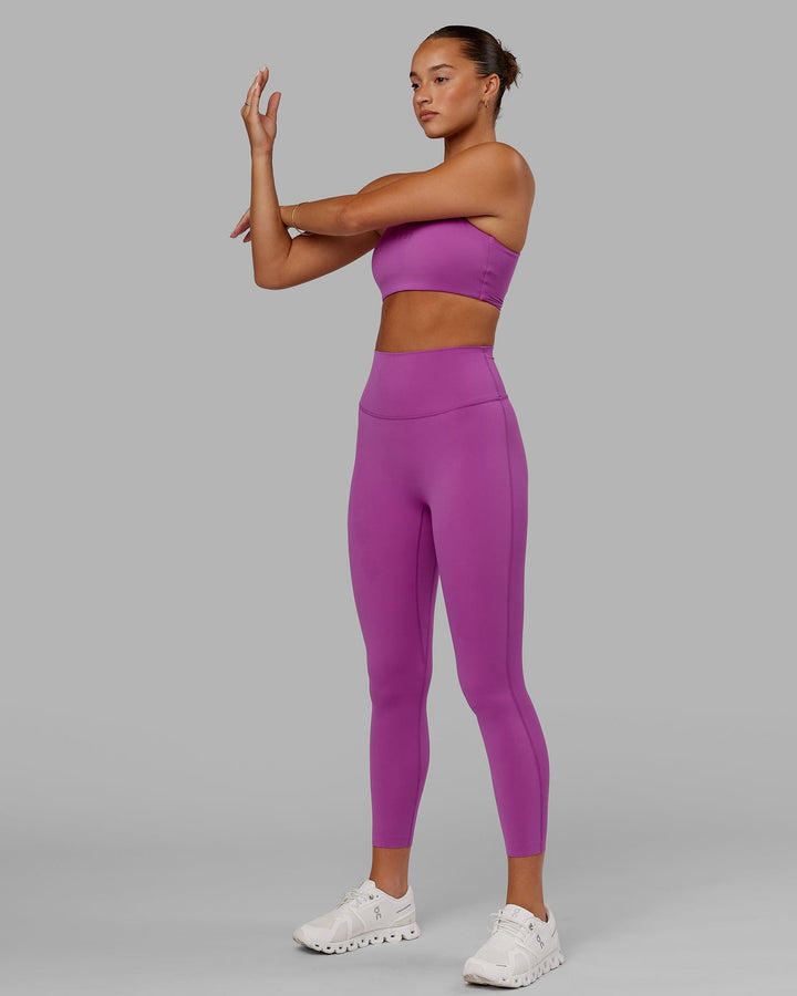 Woman wearing Elixir 7/8 Length Tight - Orchid