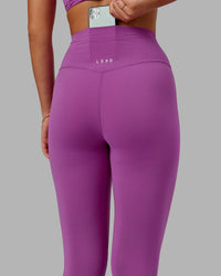 Woman wearing Elixir Ultra High-Rise Full Length Legging - Orchid