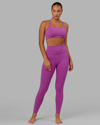 Woman wearing Elixir Ultra High-Rise Full Length Legging - Orchid