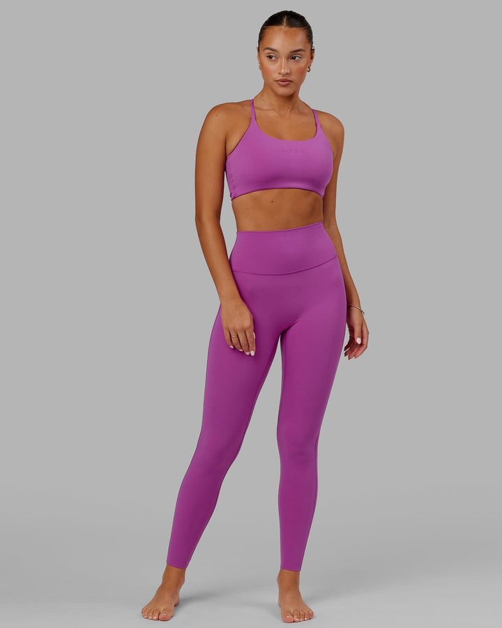 Woman wearing Elixir Full Length Tight - Orchid