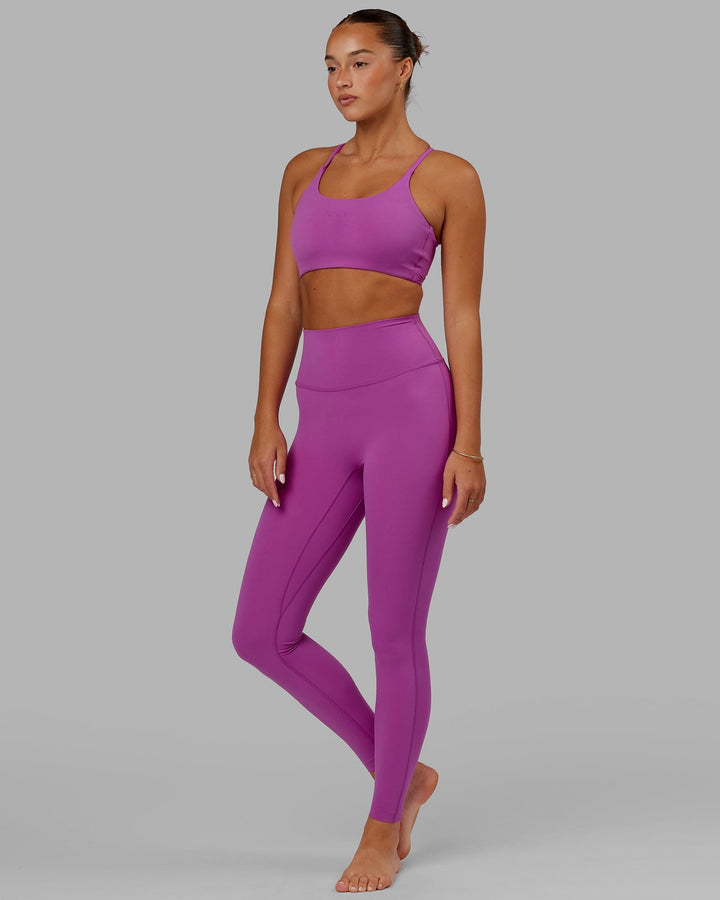 Woman wearing Elixir Full Length Tight - Orchid