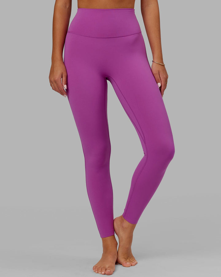 Woman wearing Elixir Full Length Tight - Orchid