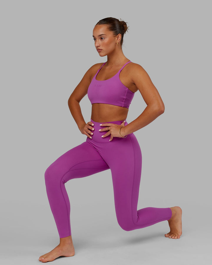 Woman wearing Elixir Full Length Tight - Orchid