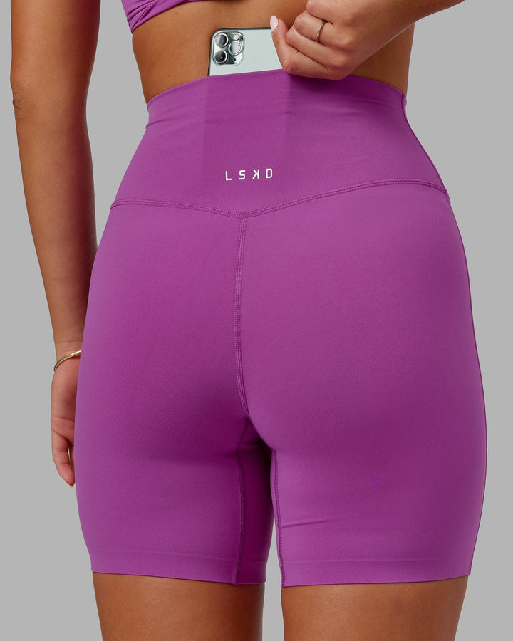 Woman wearing Elixir Mid Short Tight - Orchid