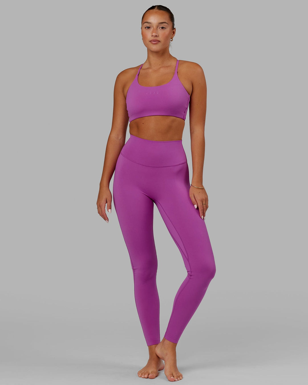 Woman wearing Elixir Ultra High-Rise Tall Legging - Orchid