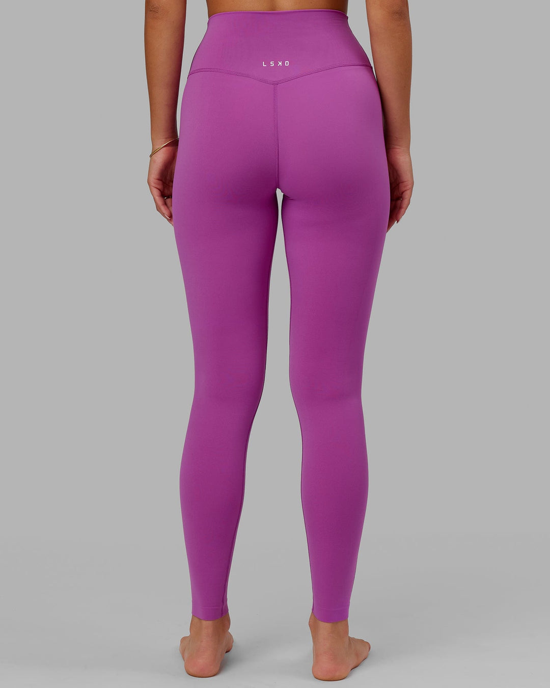 Woman wearing Elixir Ultra High-Rise Tall Legging - Orchid