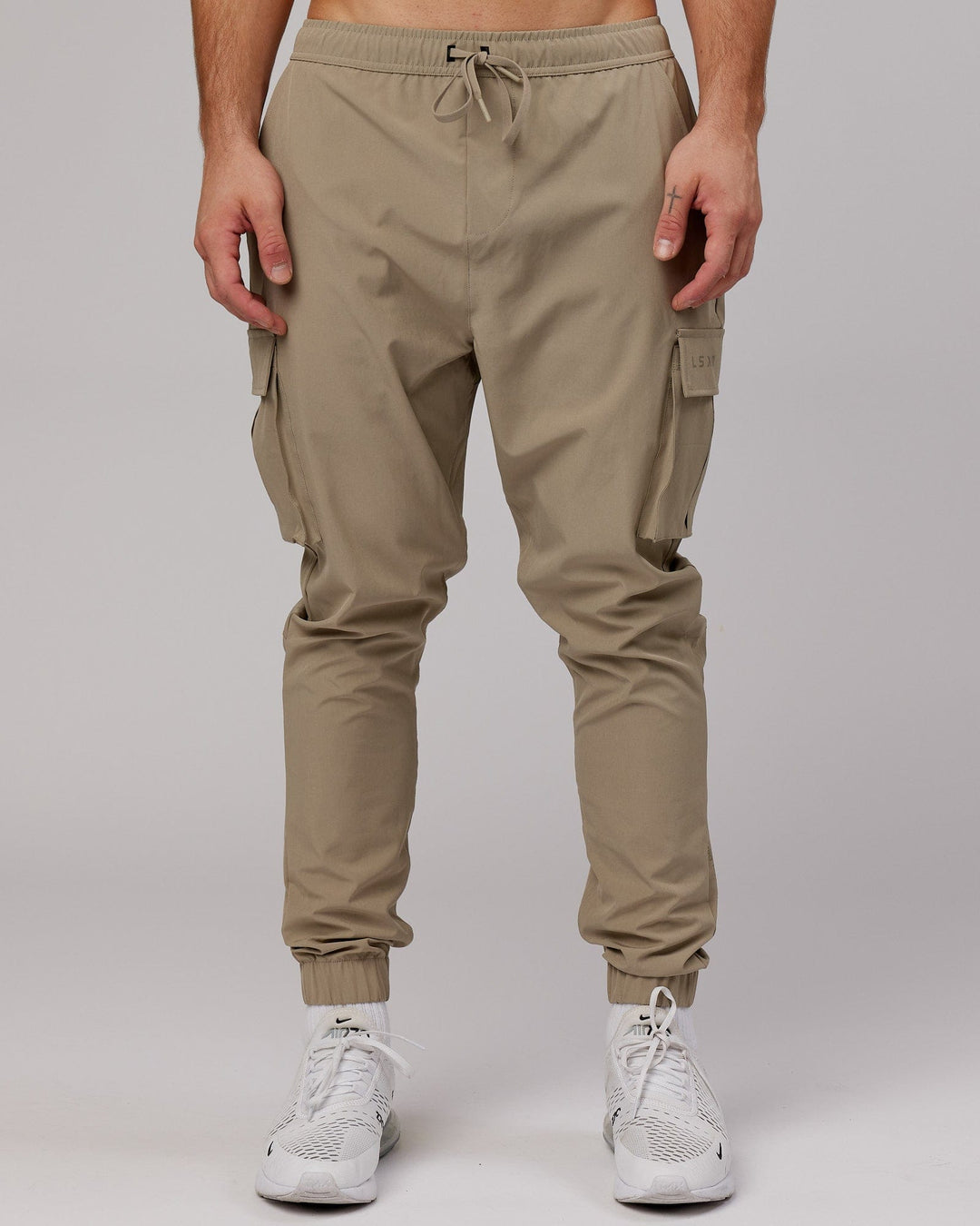 Man wearing Energy Stretch Performance Cargo Joggers - Laurel Oak