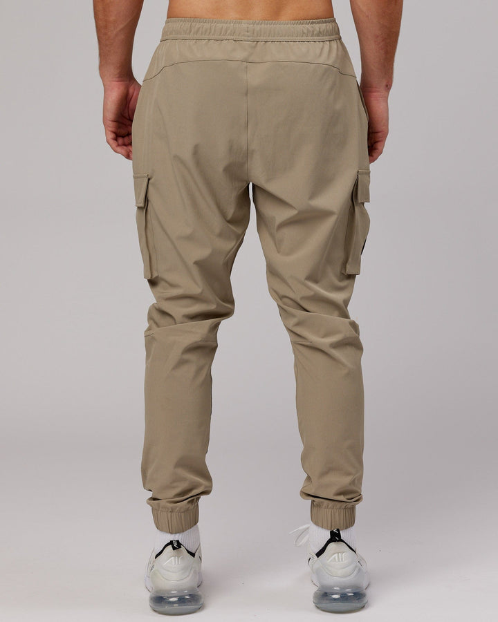 Man wearing Energy Stretch Performance Cargo Joggers - Laurel Oak