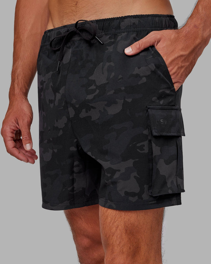 Man wearing Energy Stretch Performance Cargo Short - Black Camo