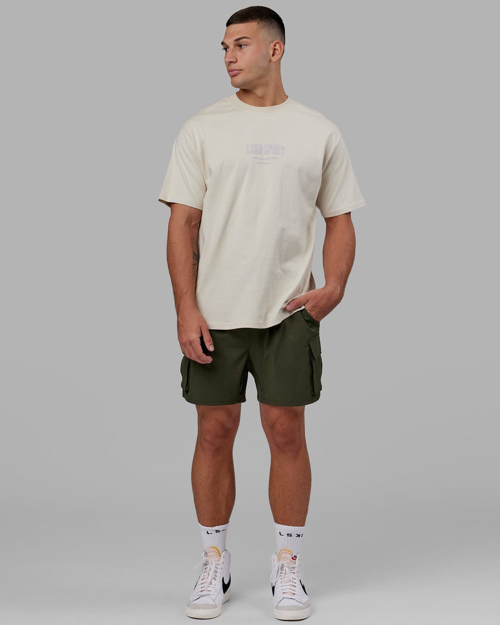 Man wearing Energy Stretch Performance Cargo Short - Forest Night