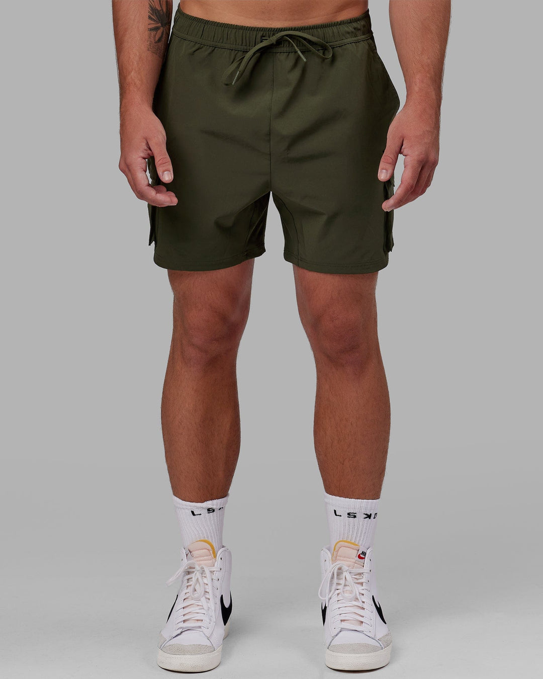 Man wearing Energy Stretch Performance Cargo Short - Forest Night