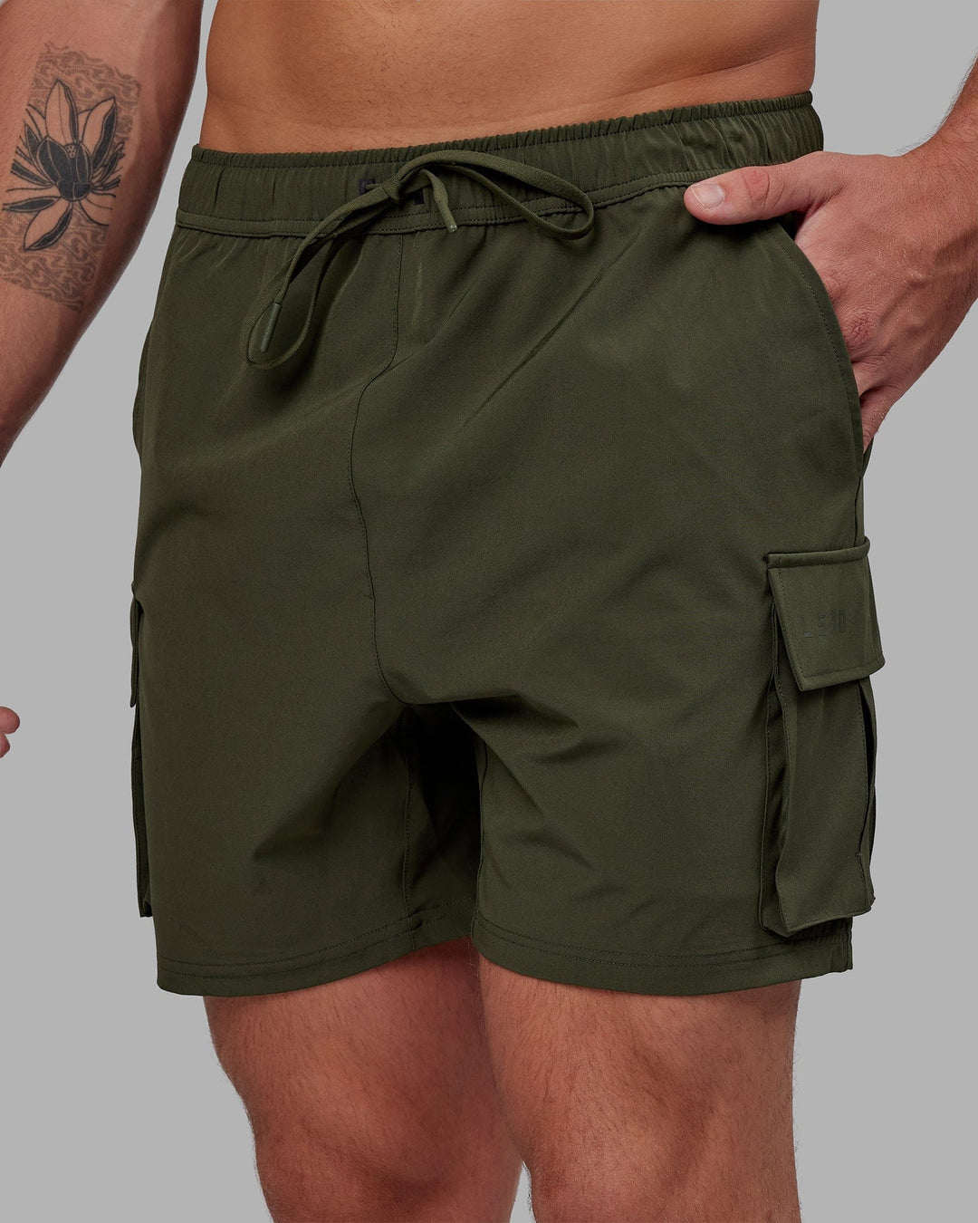 Man wearing Energy Stretch Performance Cargo Short - Forest Night