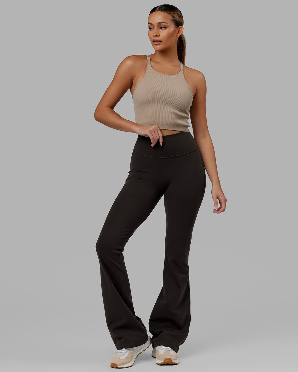 Woman wearing Everyday Flare Leggings - Dark Walnut