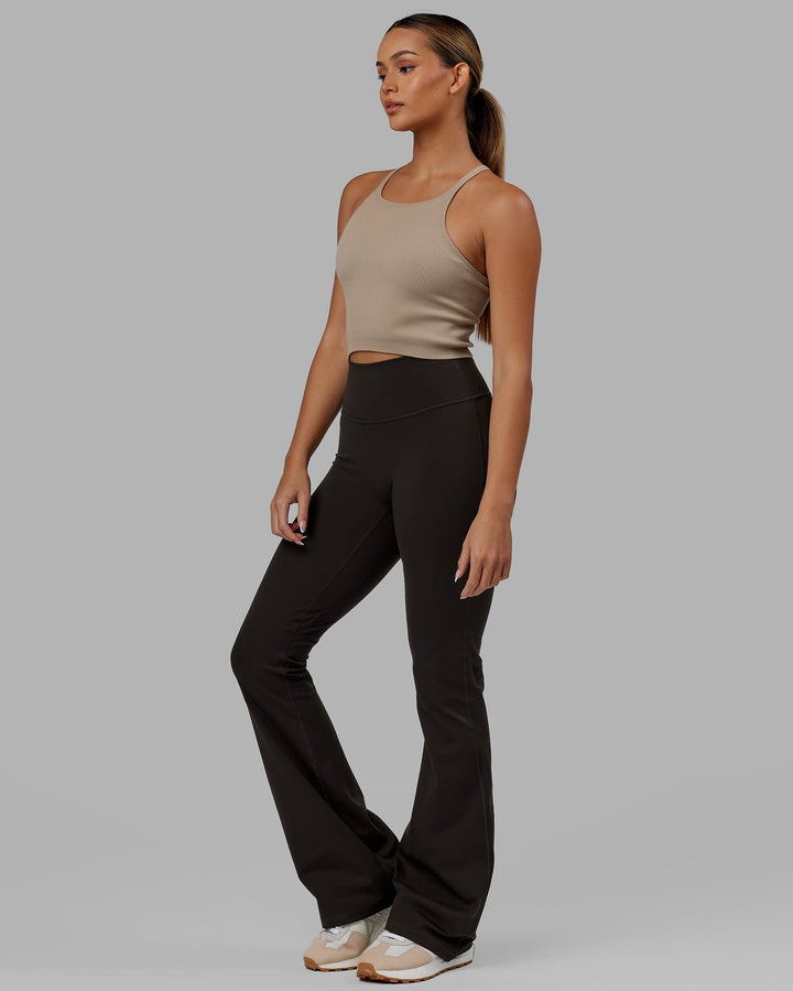 Woman wearing Everyday Flare Leggings - Dark Walnut