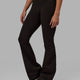 Woman wearing Everyday Flare Leggings - Dark Walnut
