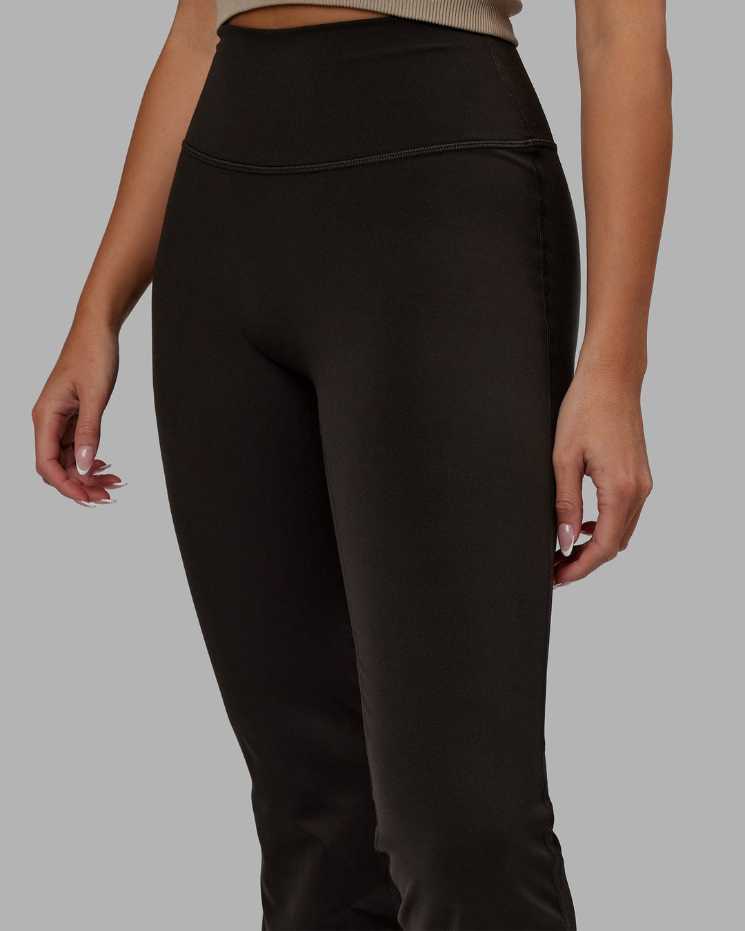 Woman wearing Everyday Flare Leggings - Dark Walnut