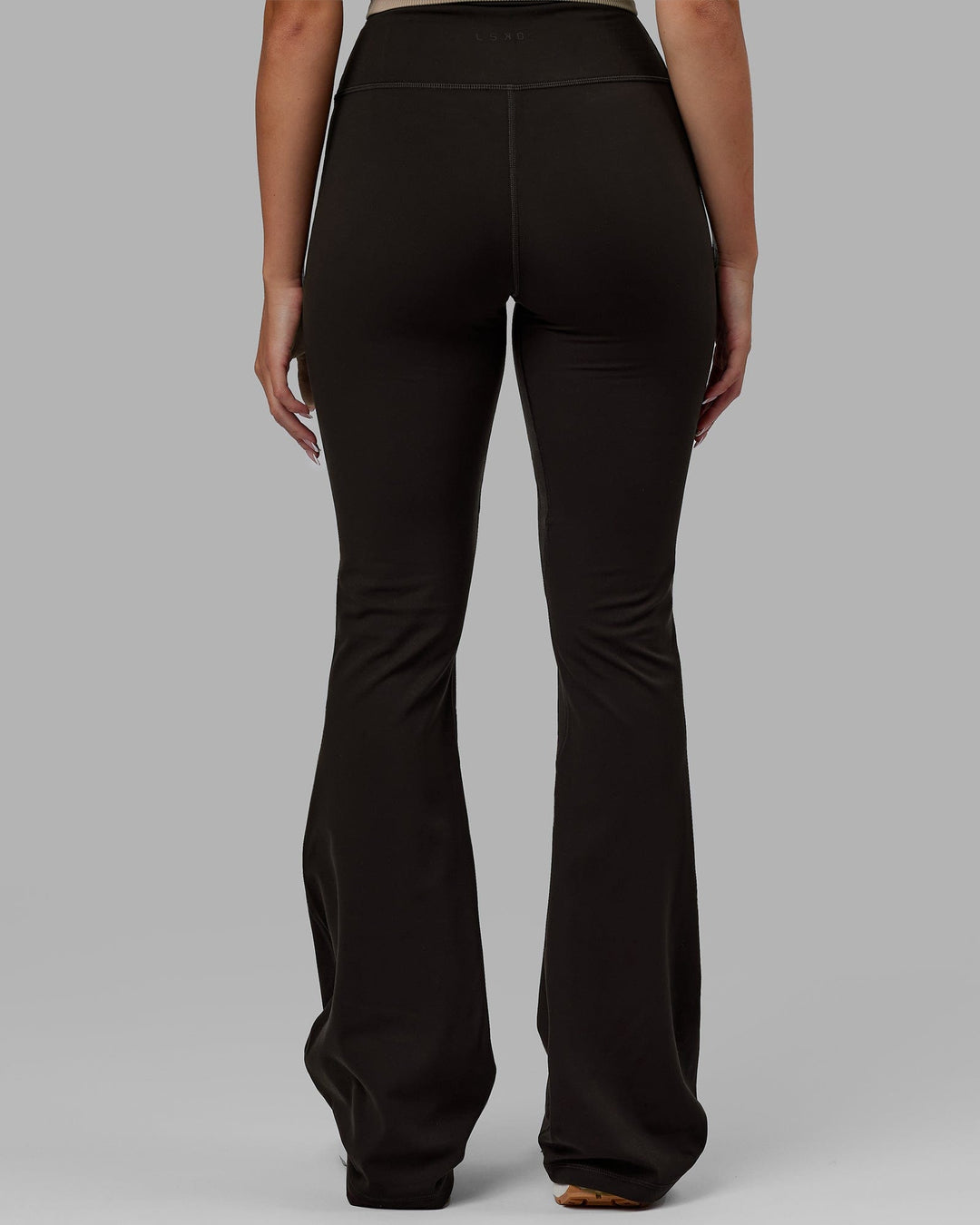 Woman wearing Everyday Flare Leggings - Dark Walnut