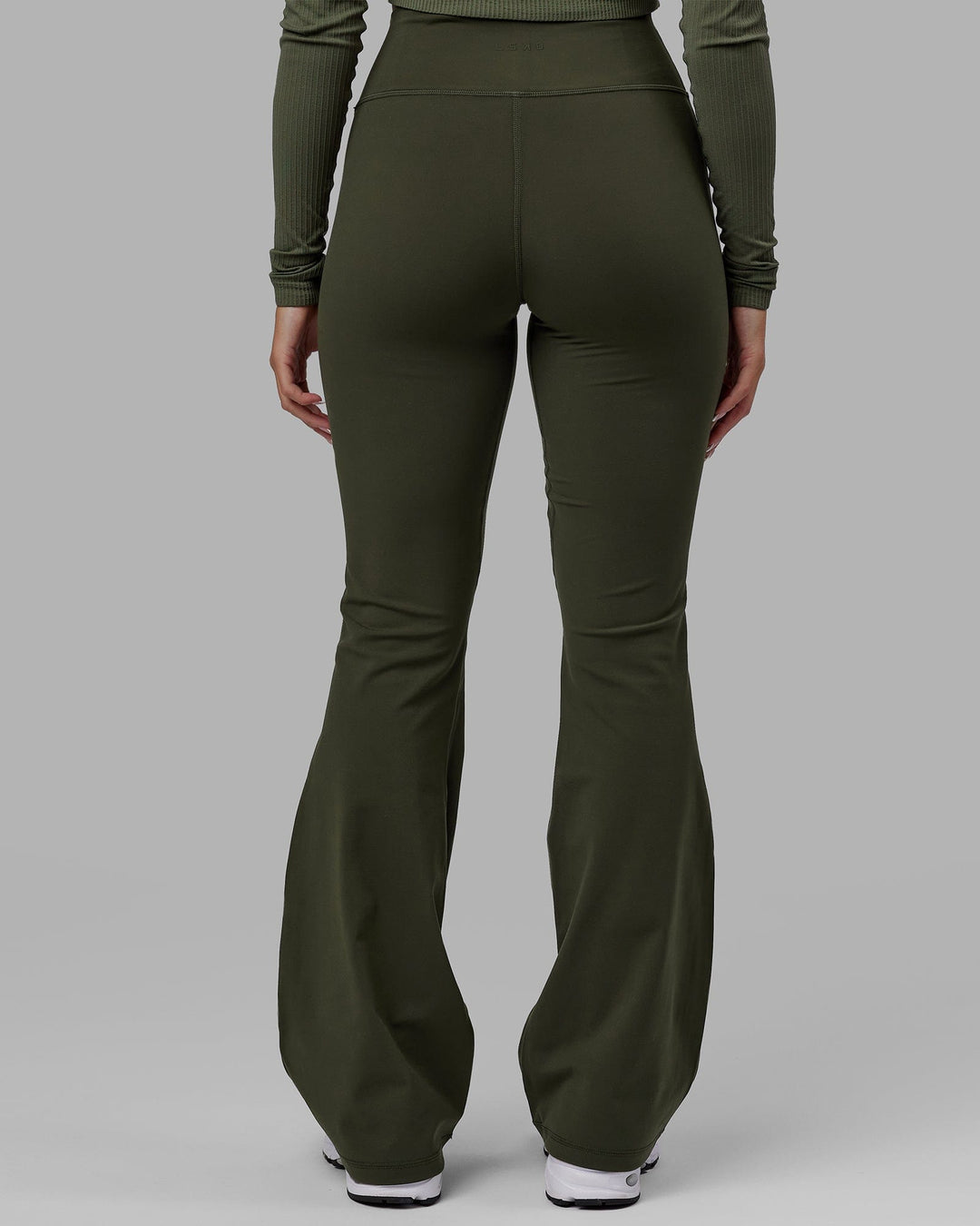 Woman wearing Everyday Flare Leggings - Forest Night