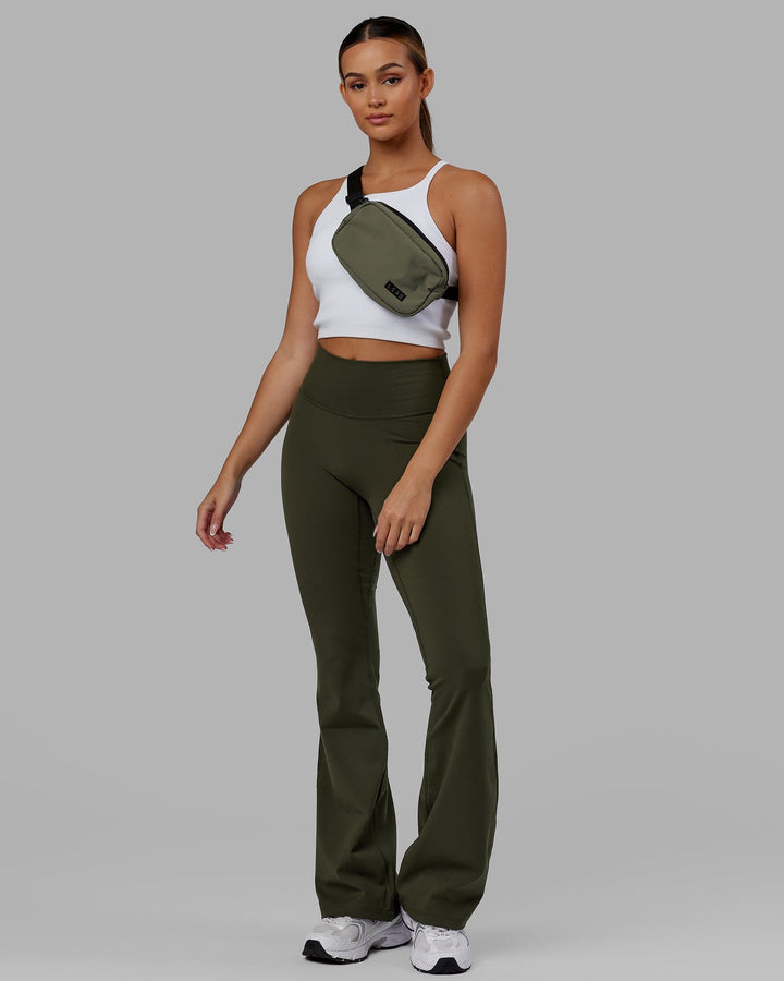 Woman wearing Everyday Flare Leggings - Forest Night