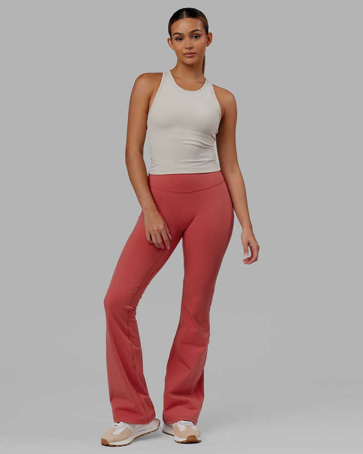 Woman wearing Everyday Flare Leggings - Mineral Red