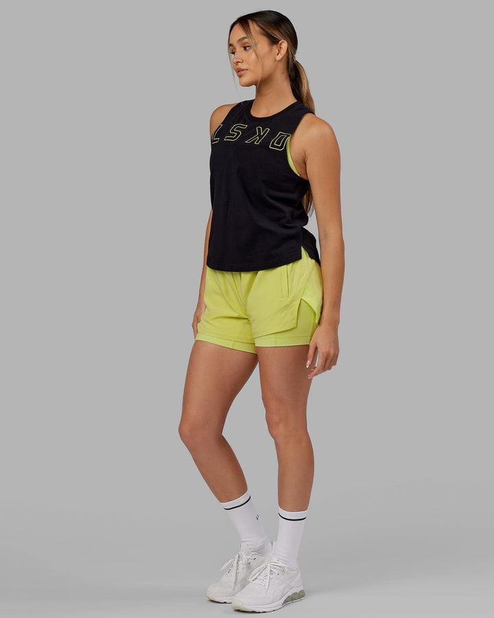 Woman wearing Expand FLXCotton Tank - Black-Citrus Green