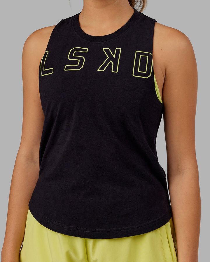 Woman wearing Expand FLXCotton Tank - Black-Citrus Green