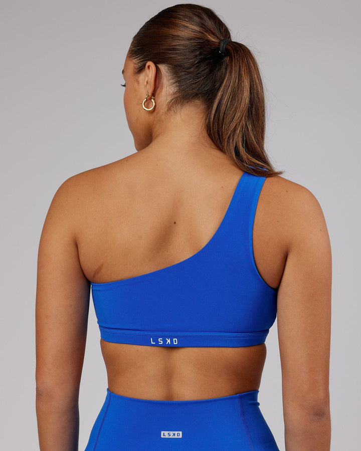 Woman wearing Flex Sports Bra - Strong Blue