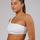 Woman wearing Flex Sports Bra - White