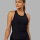 Woman wearing Flow Ribbed Shelf Bra Tank - Black