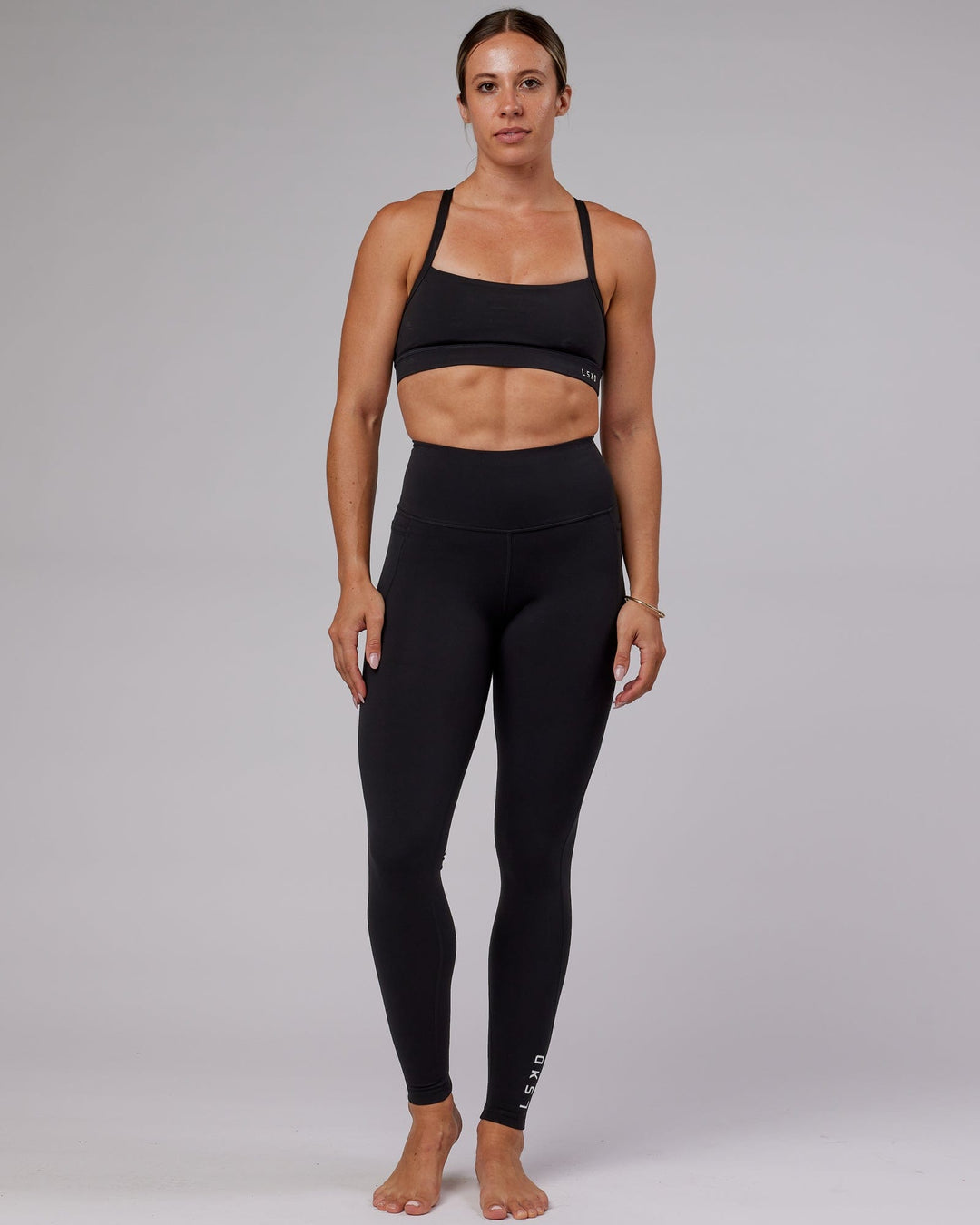 Woman wearing Flux Ultra High-Rise Tall Legging Pockets - Black