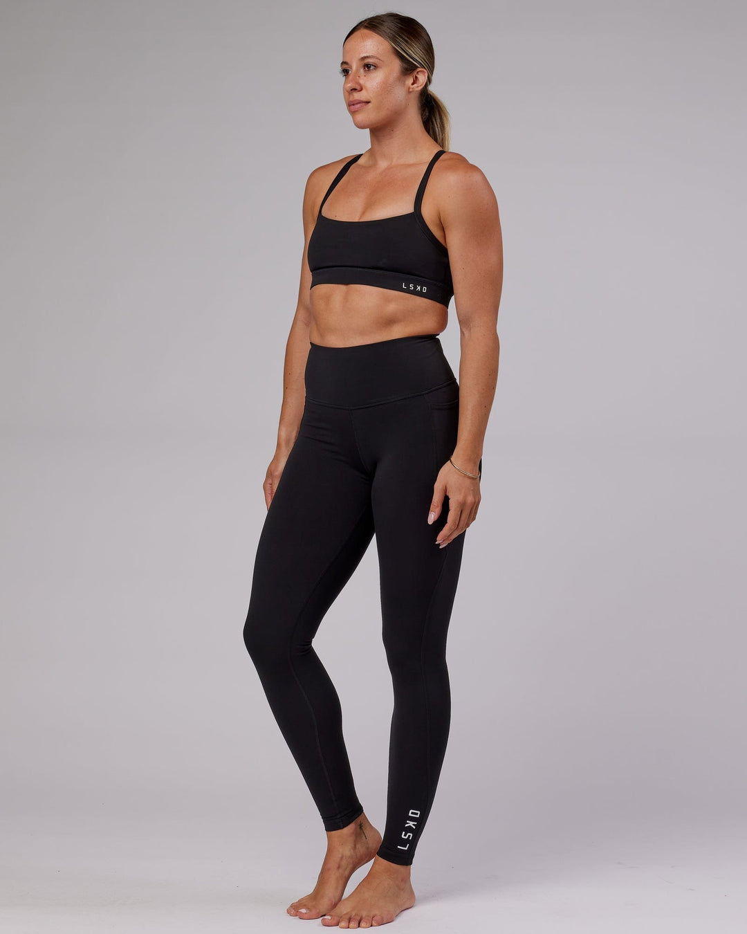 Woman wearing Flux Ultra High-Rise Tall Legging Pockets - Black