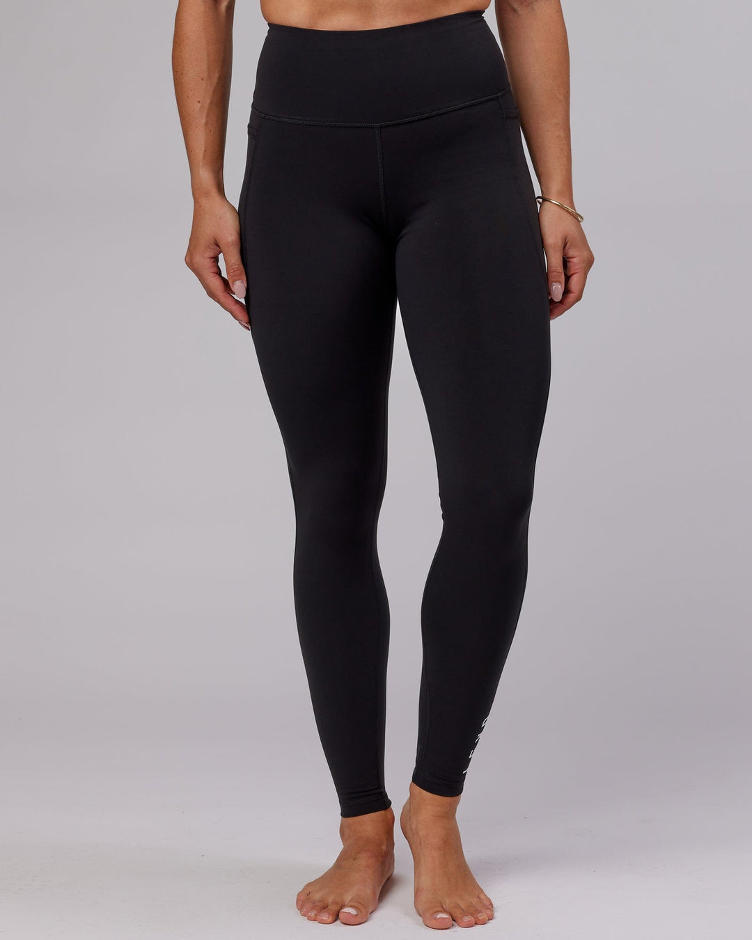 Woman wearing Flux Ultra High-Rise Tall Legging Pockets - Black