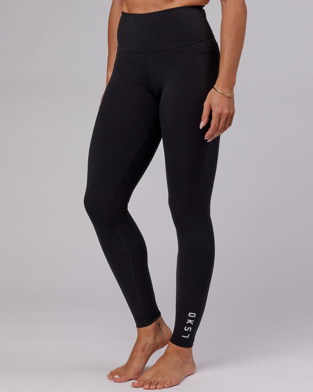 Woman wearing Flux Ultra High-Rise Tall Legging Pockets - Black