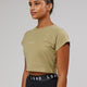 Woman wearing Front Runner Baby Tee - Reed