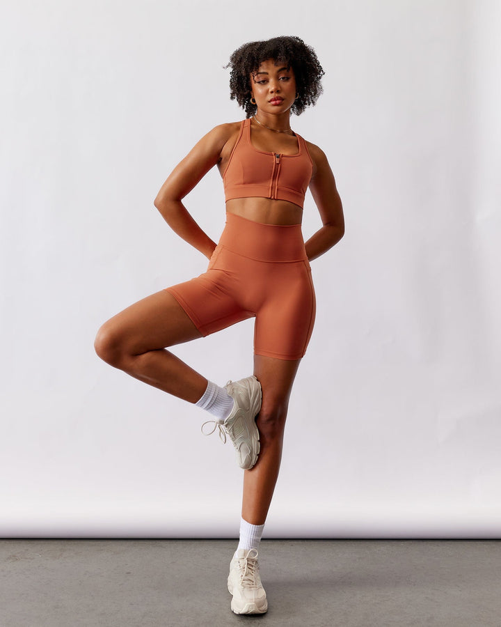 Woman wearing Fusion Mid Short Tight - Auburn